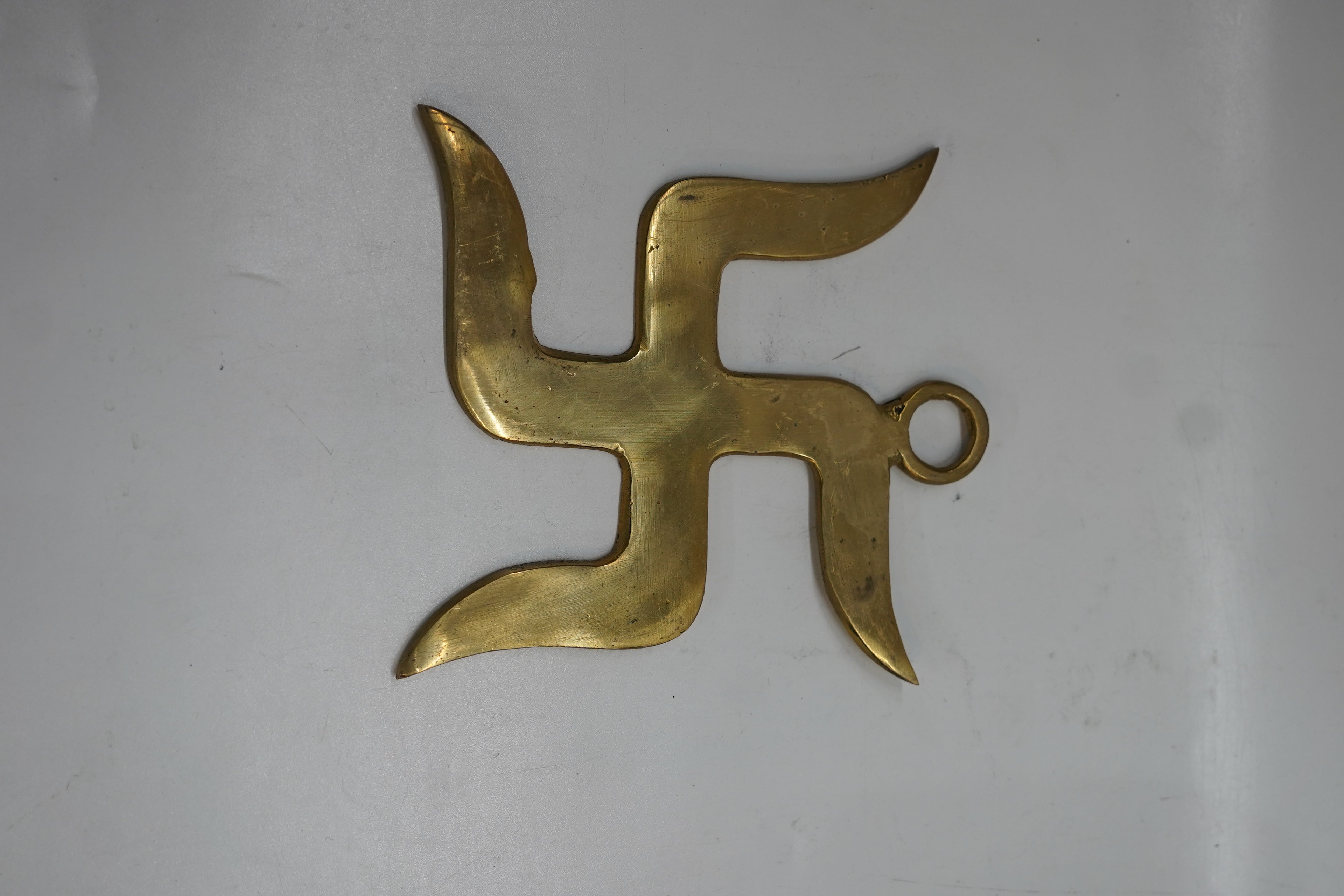 Handcrafted Pure Brass Wavy Swastik Wall Hanging | Curved Edge Auspicious Vastu Swastika Door Emblem for Home Entrance